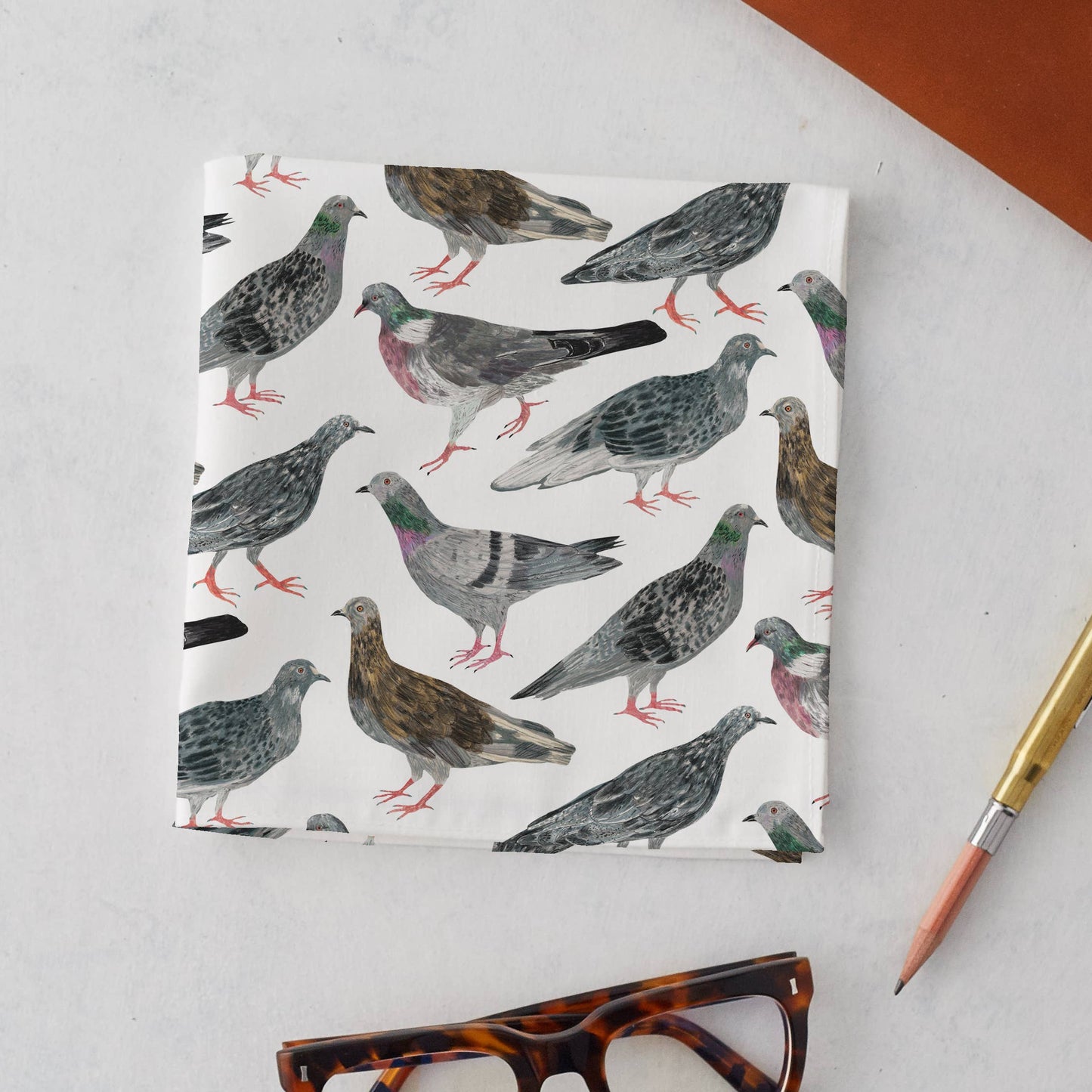 Uniquely illustrated pigeons dance across this delightful handkerchief pocket square in a fun repeat pattern. 35x35cm. Designed and made in the UK.