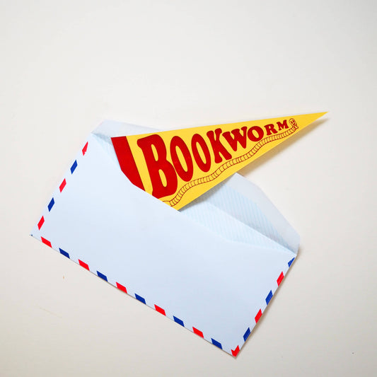 Bookworm pennant card hanging as decor, showing blank reverse for message