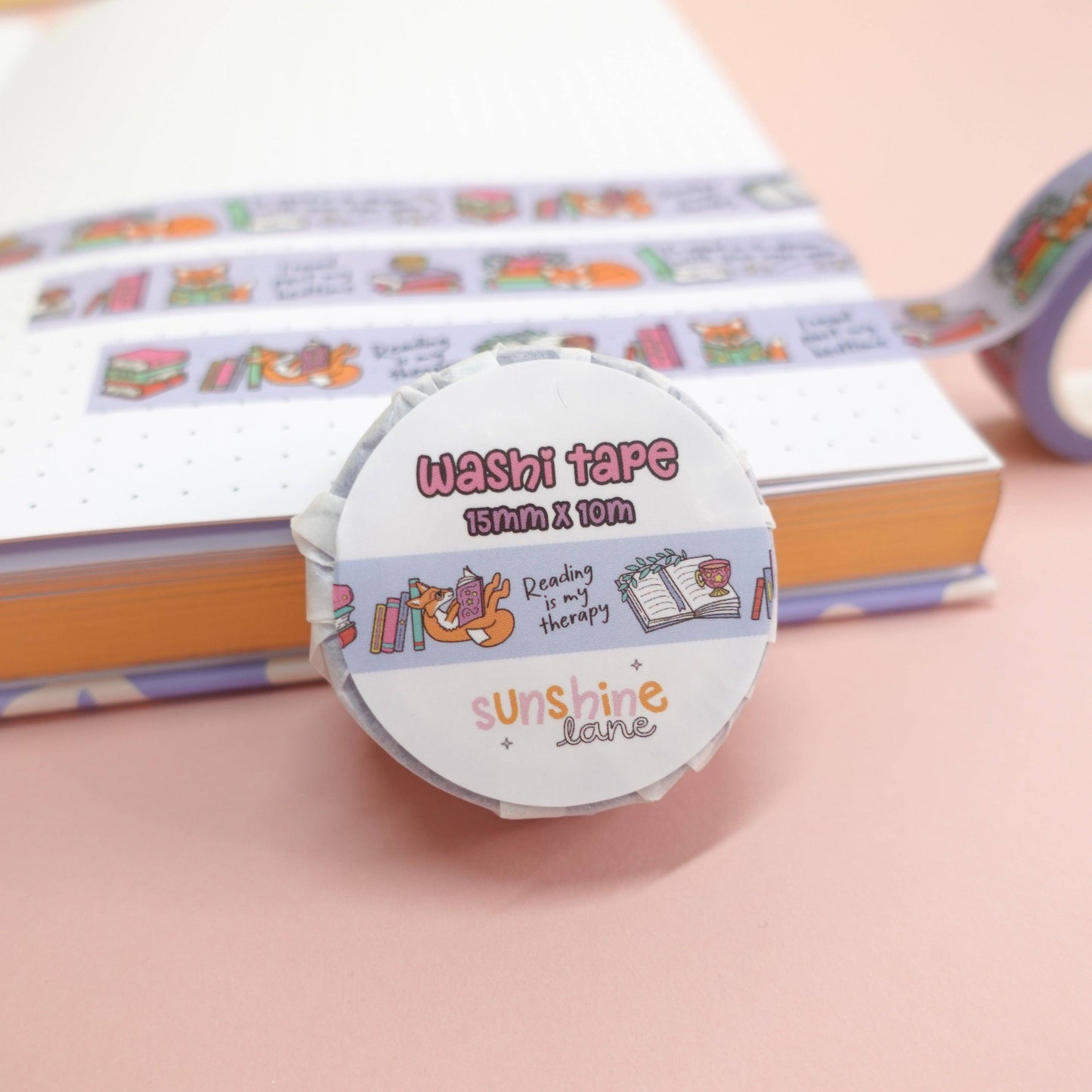 Cosy washi tape with Maple the Fox and bookish illustrations, fun reading quotes, eco-friendly paper packaging—great for planners, crafts, and gifts.