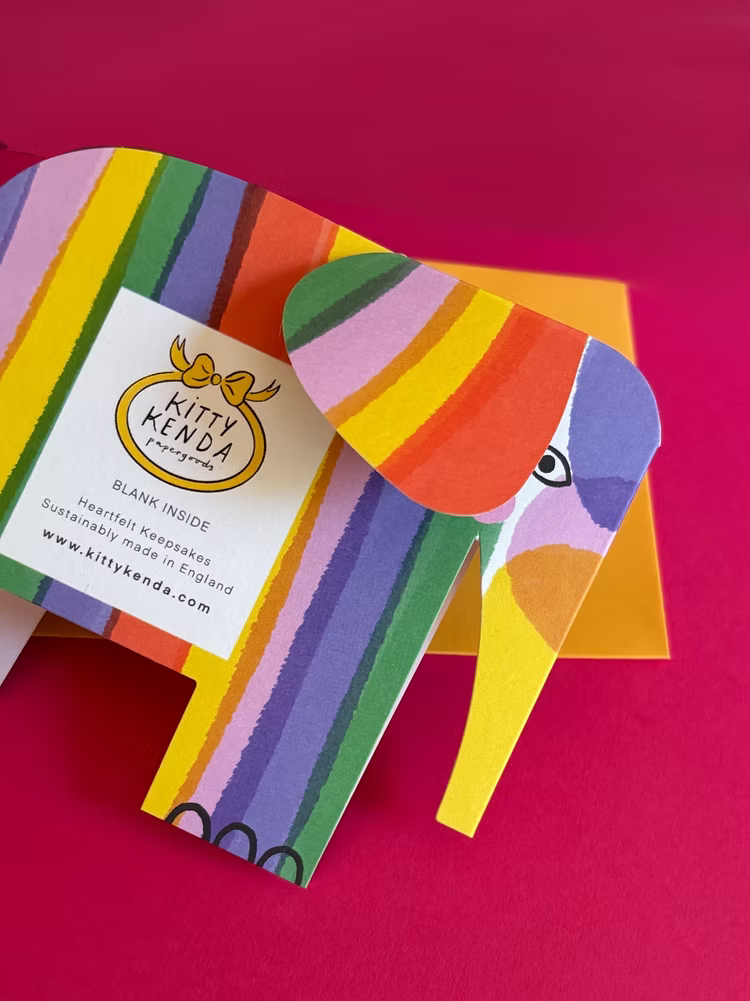 Colourful abstract elephant greeting card with a yellow envelope. Designed and printed in the UK by Kitty Kenda.