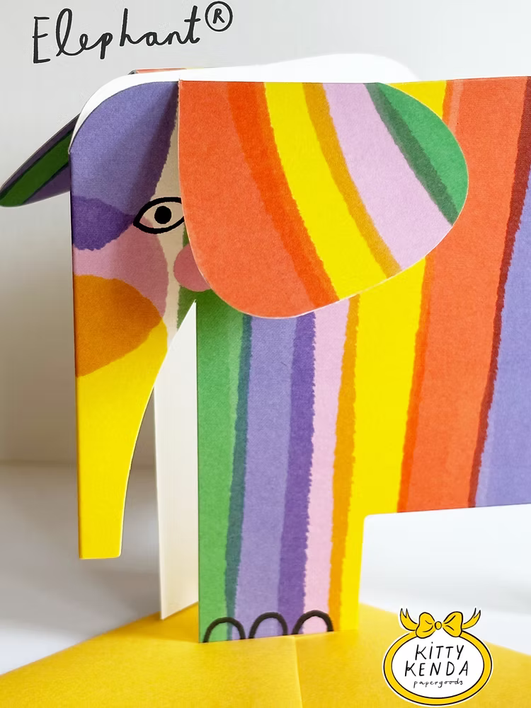 Colourful abstract elephant greeting card with a yellow envelope. Designed and printed in the UK by Kitty Kenda.