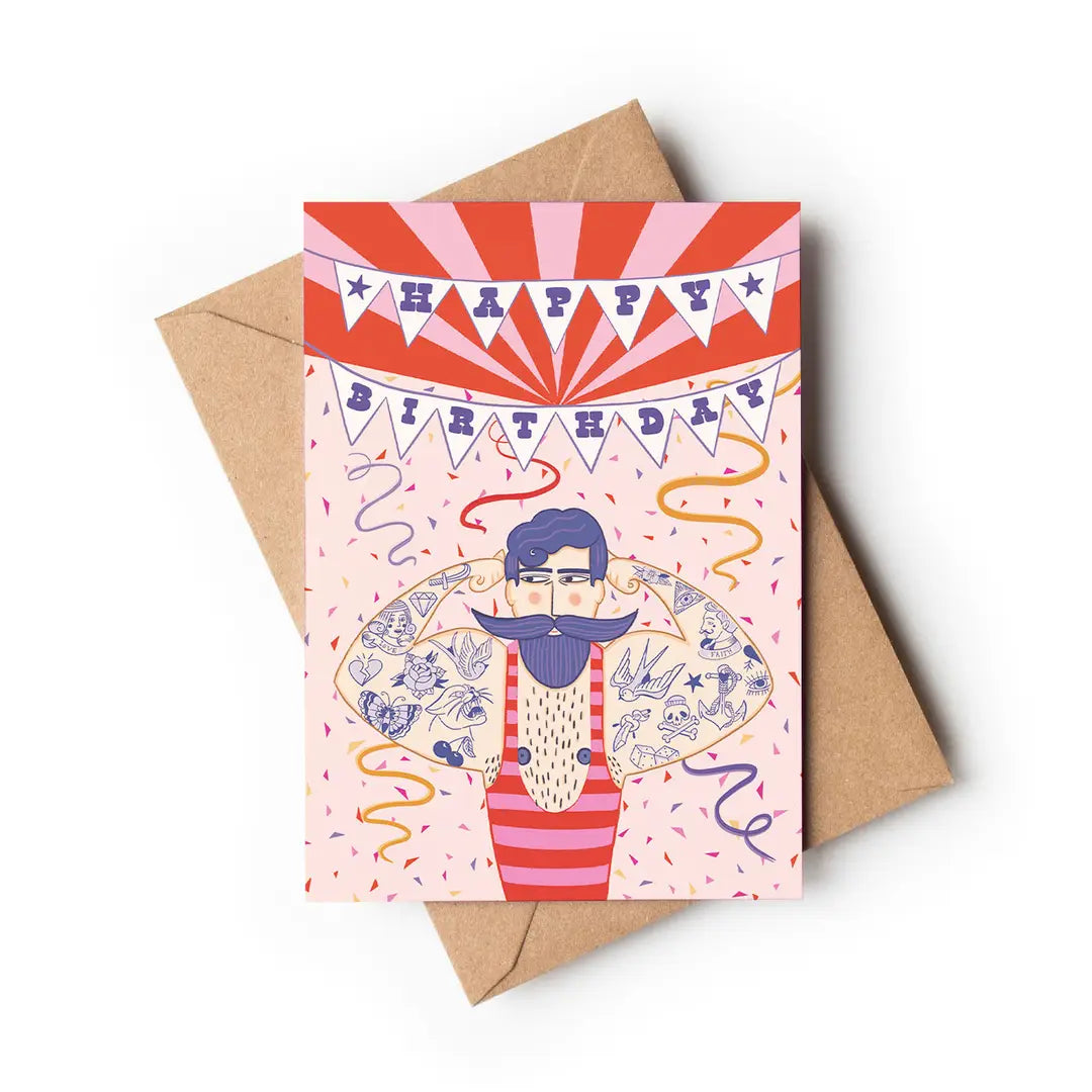 Close-up of Circus Strongman Birthday Card, showing Perlino Cotton texture and Su Owen's illustration detail.