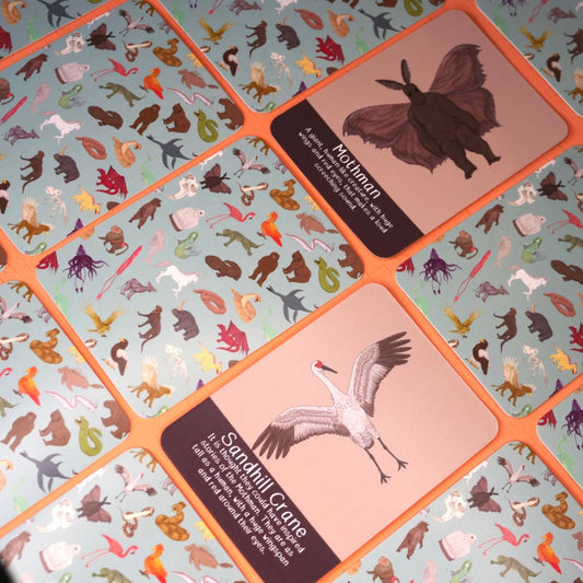 Mythical creature card with description and amazing animal card