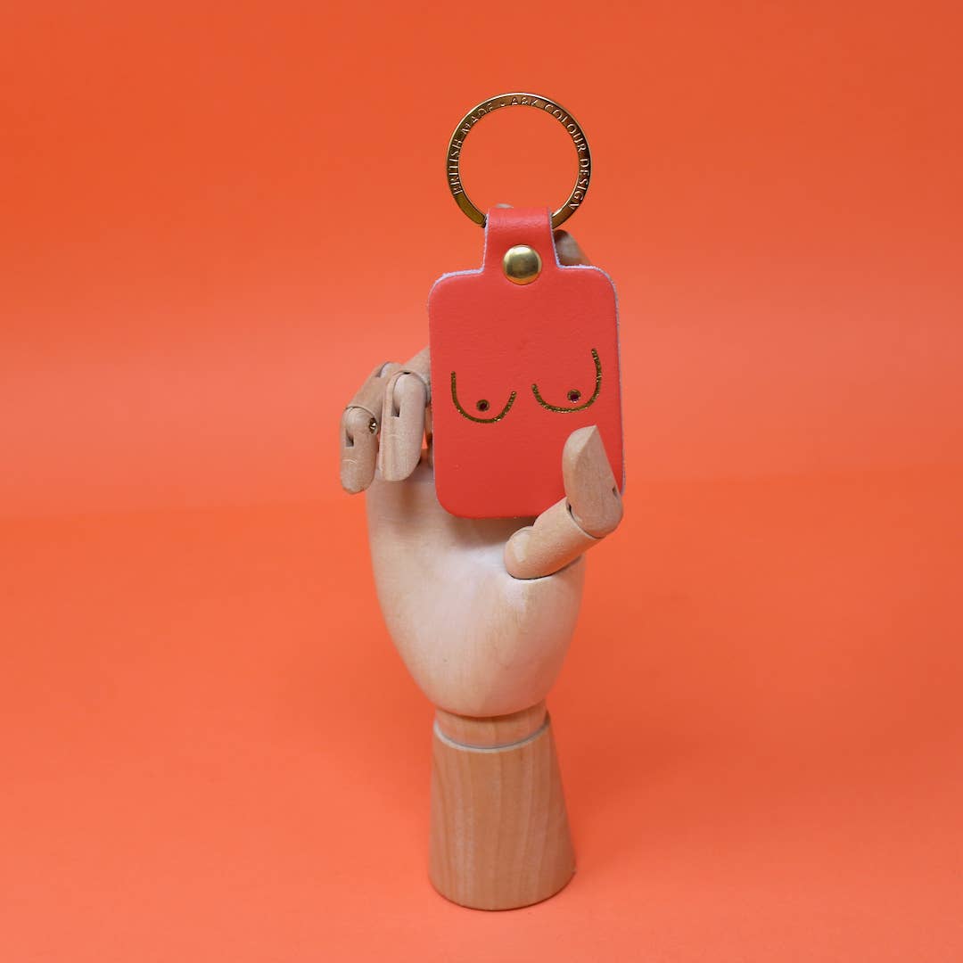 Boob keyring in genuine leather with gold-plated ring, made in Scotland, eco-friendly gift.