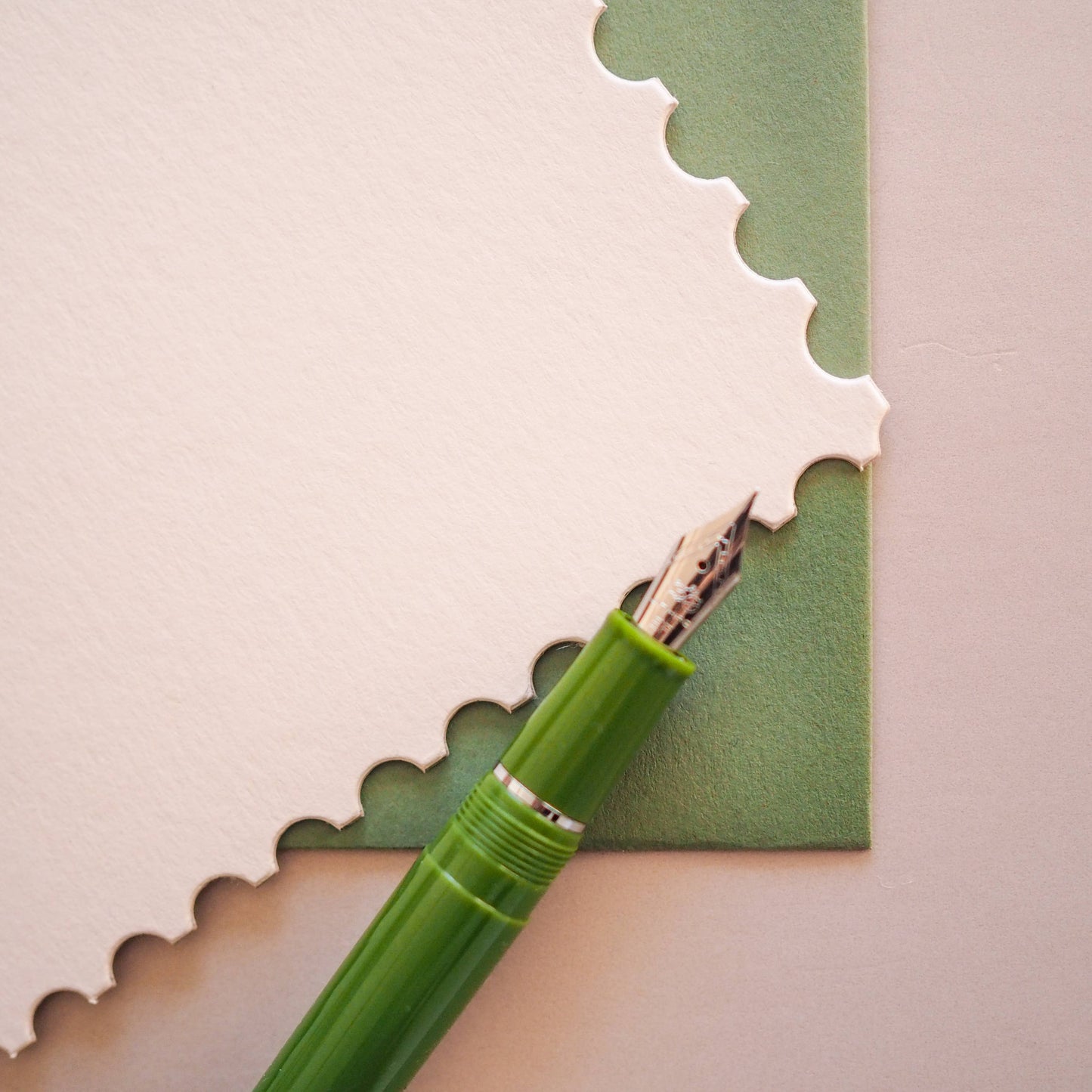 Luxury hand die-cut stamp notecard writing set in beige and green with coordinating envelope
