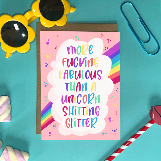 A6 'More F**ing Fabulous Than a Unicorn' greeting card alongside a Kraft envelope, showcasing the premium textured card stock.