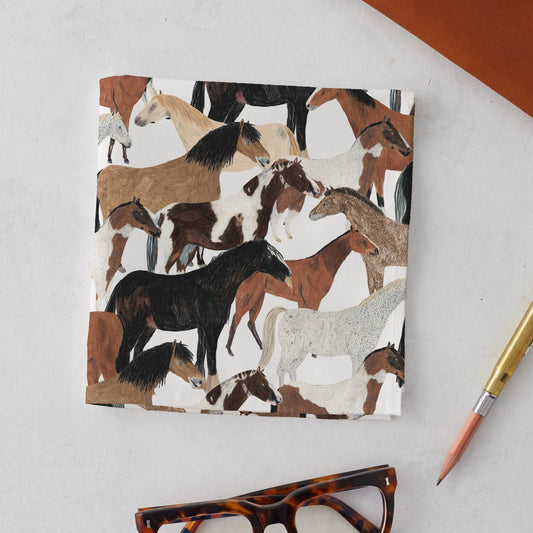 Close-up of colourful pony print on James Barker Studio handkerchief
