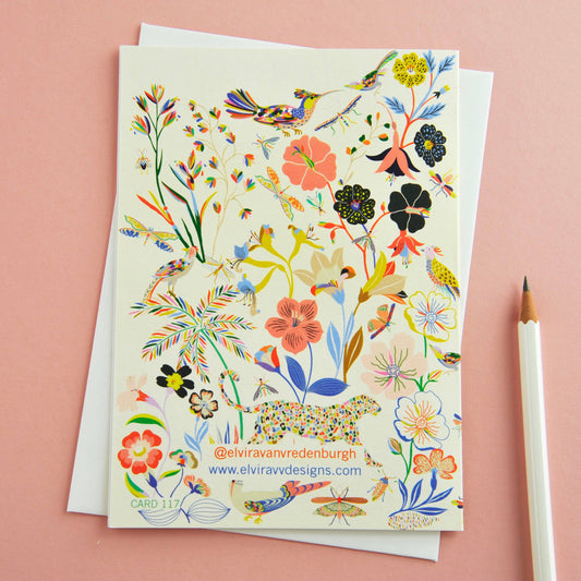 Detailed vibrant floral and fauna design on a leopard greetings card