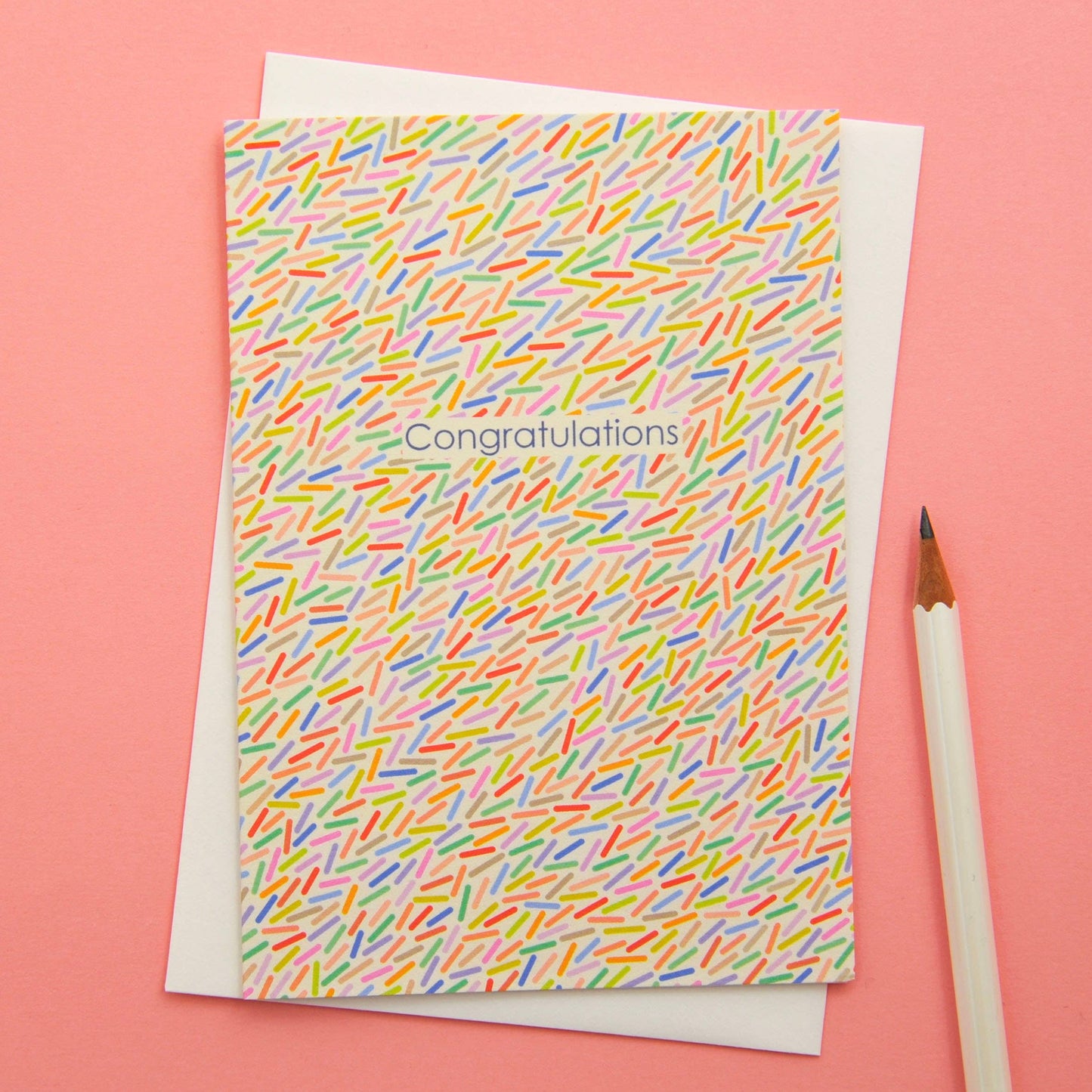 Abstract colourful confetti congratulations greeting card on sustainable 350gsm matt card, with cream envelope and biodegradable sleeve.