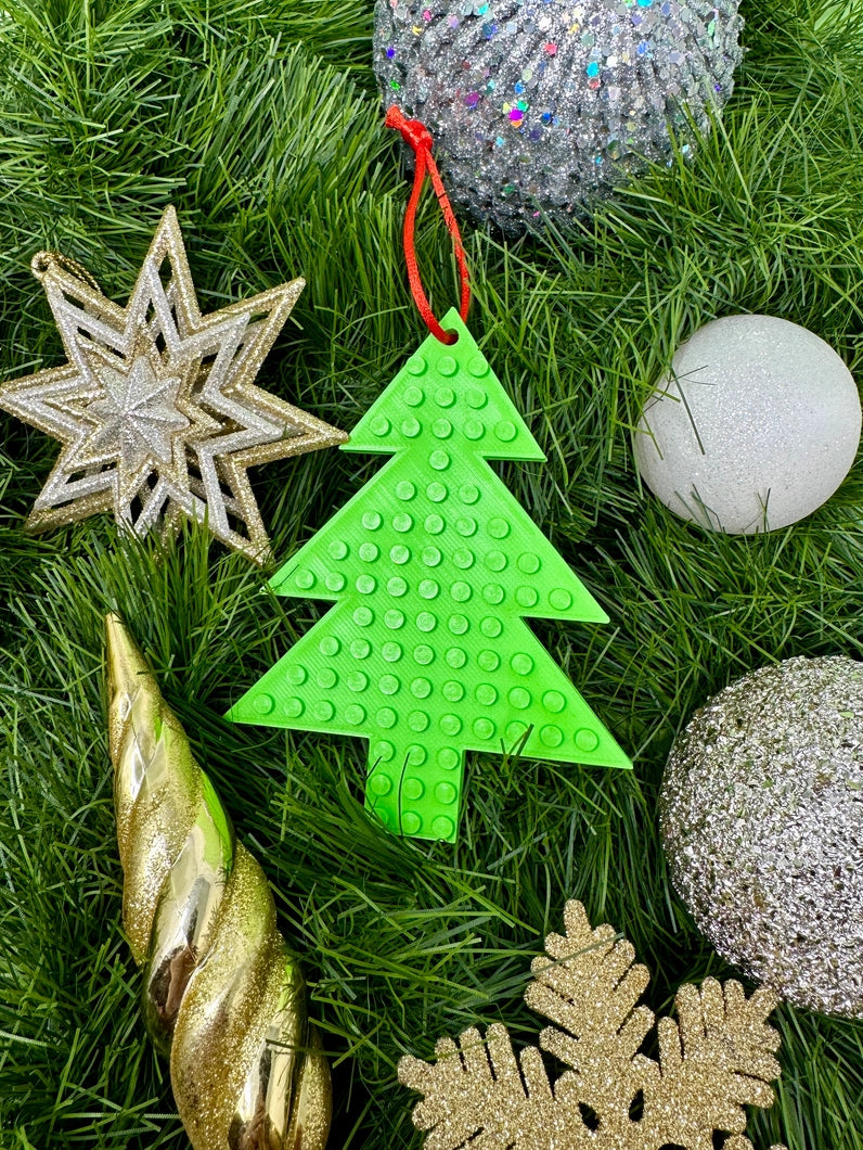 Made Happy Christmas Tree Decoration. These Christmas hanging silhouettes would be a fantastic addition to your tree. Why not add eyes, a scarf and decoration to the hat with bricks and dots to personalise them? A fun and mindful activity for both children and adults alike!