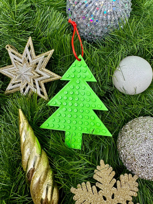 Made Happy Christmas Tree Decoration. These Christmas hanging silhouettes would be a fantastic addition to your tree. Why not add eyes, a scarf and decoration to the hat with bricks and dots to personalise them? A fun and mindful activity for both children and adults alike!