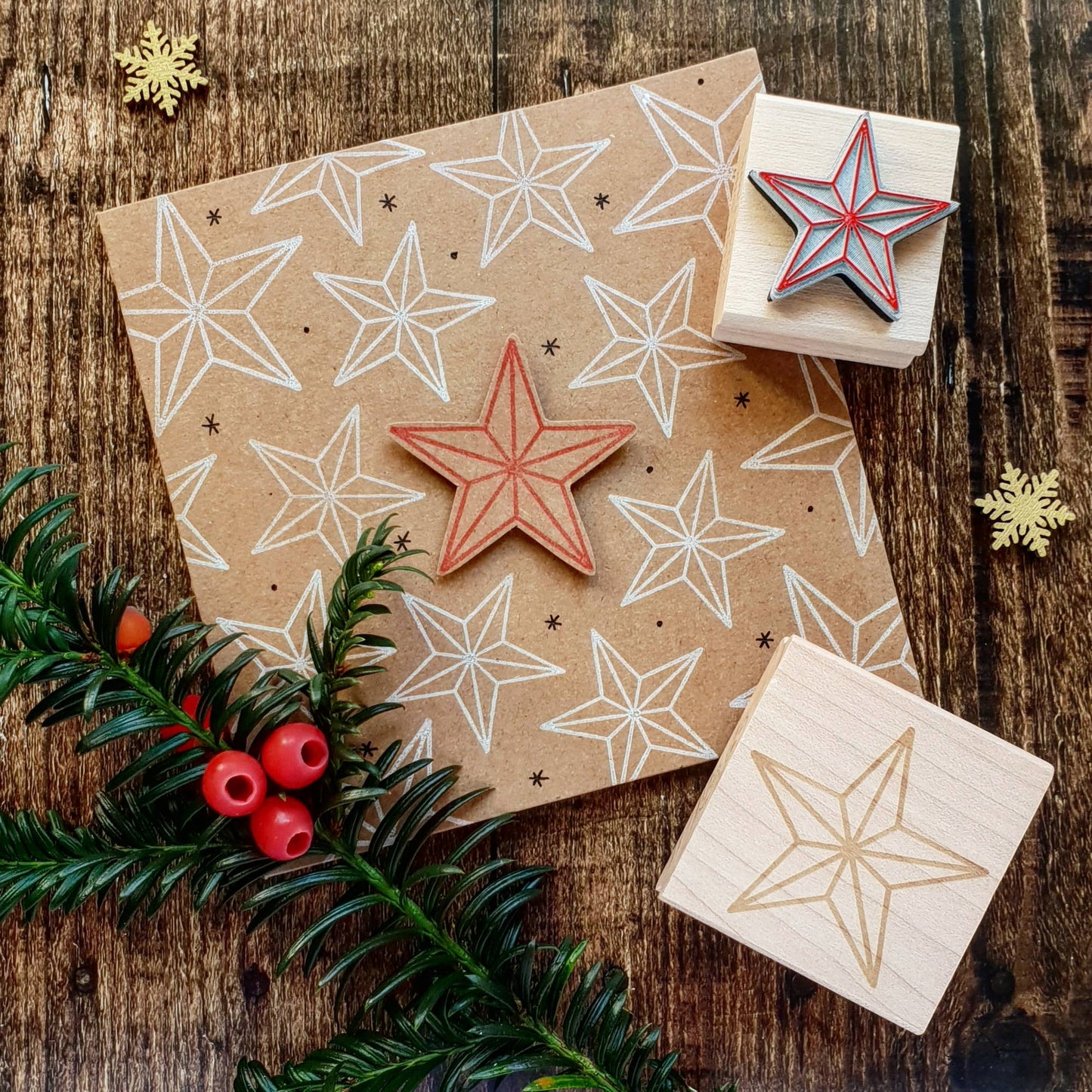 Bevelled star rubber stamp, handmade on eco-friendly hourglass wooden blocks, perfect for sustainable Christmas card making and gift wrapping, made in Devon UK