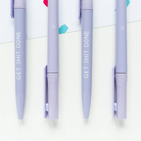 Vibrant lilac recycled pen, 'Get Shit Done' slogan, sustainable stationery for an eco-conscious workspace.