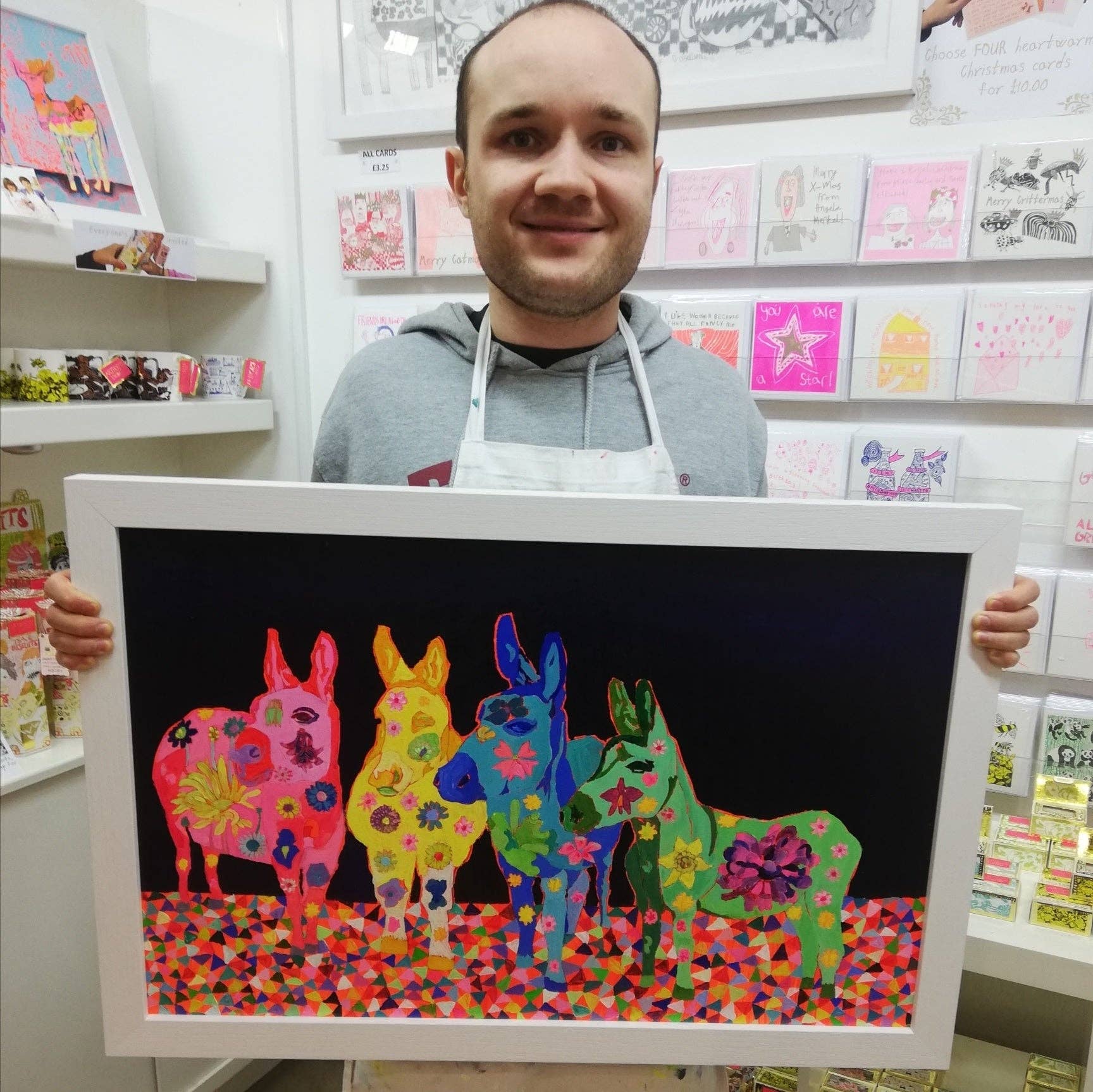 Dusty Road silky dark chocolate bar with marshmallows and biscuit, wrapped in colourful foil featuring Jack Churchyard artwork in a gold frame.