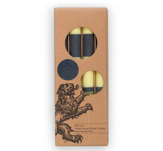 Close-up of British Colour Standard eco dinner candles, showing striped olive and indigo design