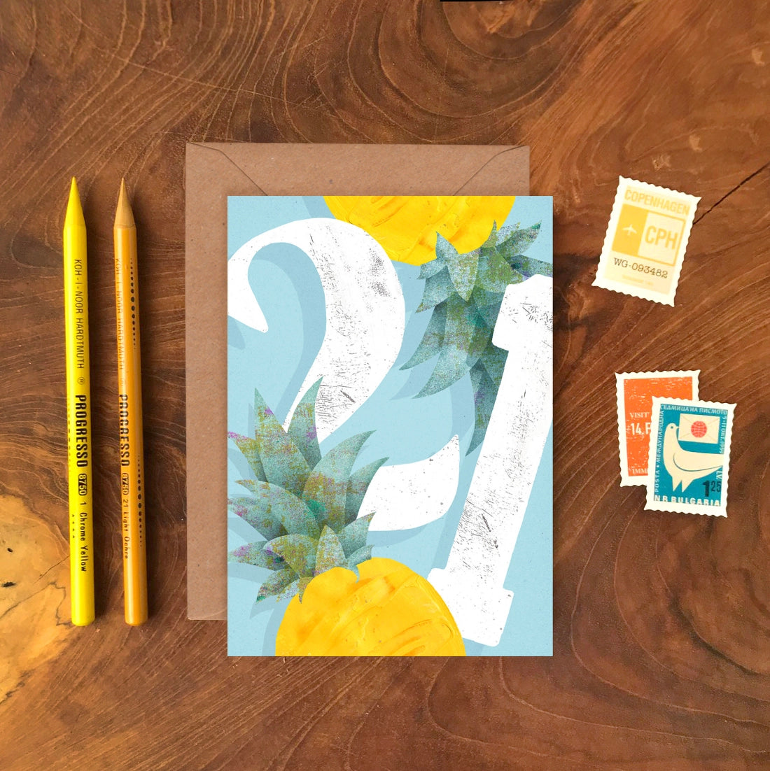 A6 greeting card featuring illustrated pineapple and ‘Twenty One’ caption by Emily Nash, printed on sustainable matte card with a recycled kraft envelope