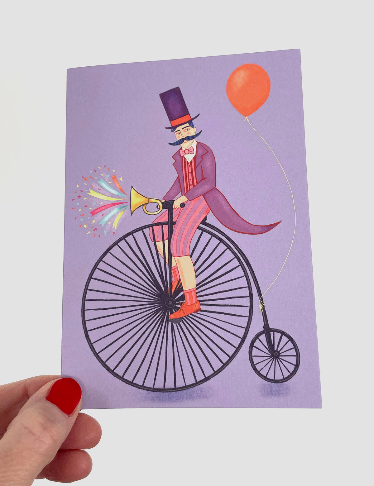 Close up of textured sustainably sourced paper on circus themed card