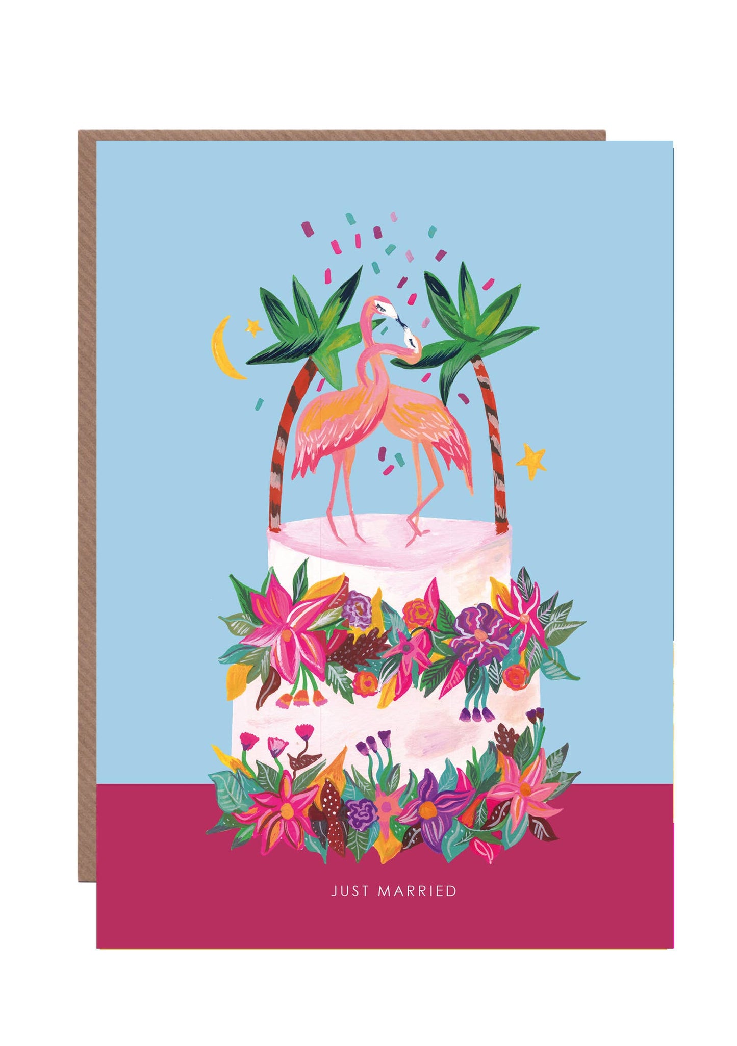 Close-up of a 'Just Married' greetings card featuring a vibrant illustration of pink flamingos dancing atop a multi-tiered wedding cake, with green foliage and flowers, against a white background.
