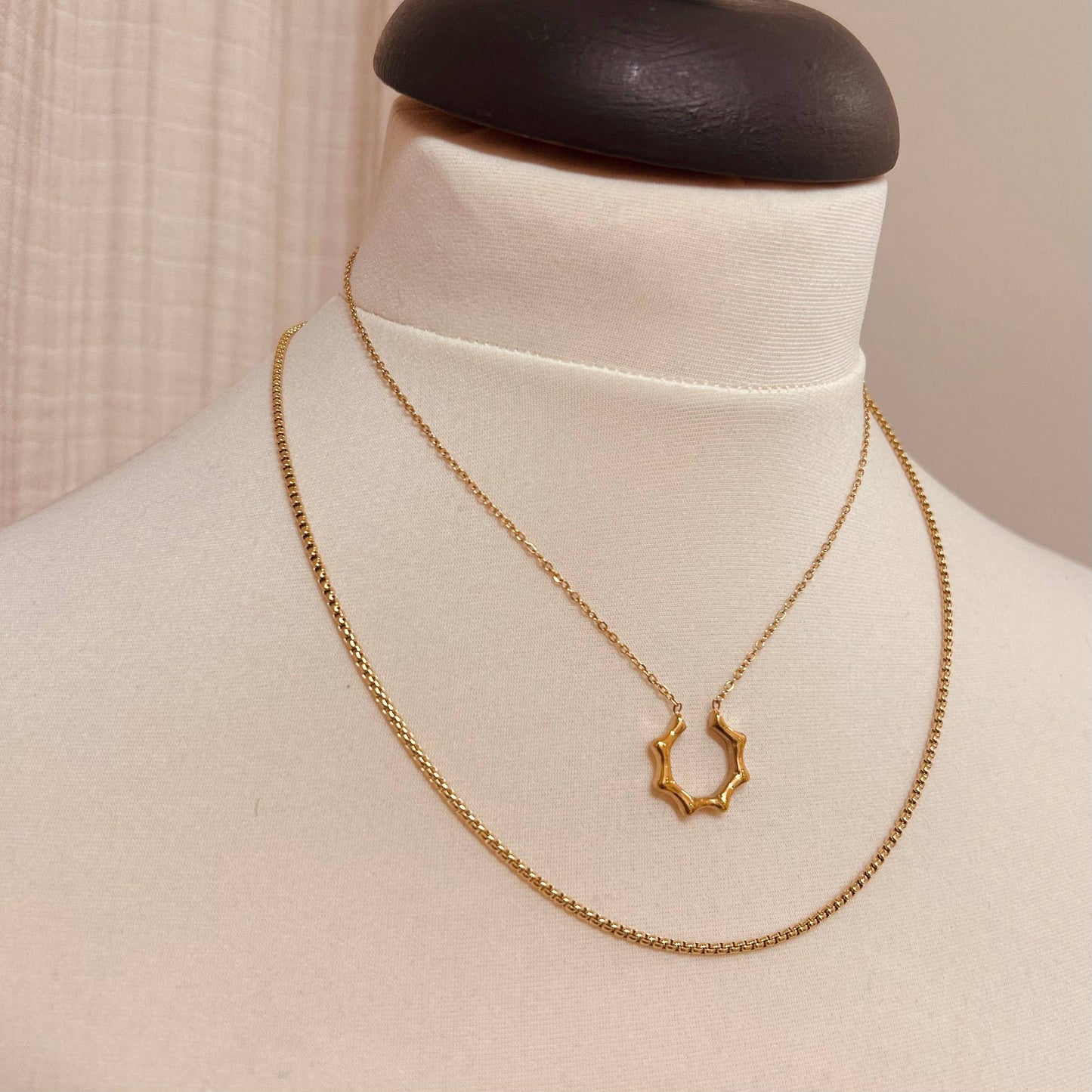 Gold Plated Sun Ray Necklace on display, highlighting polished finish and design.