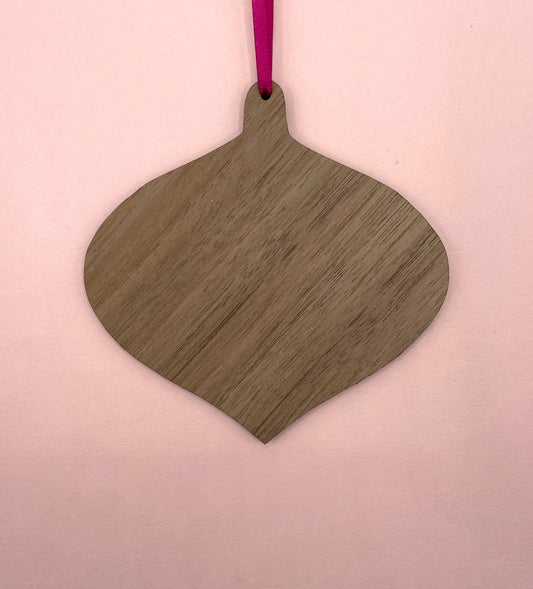 Eco-friendly Pink Strongman wood ornament by Su Owen, glossy finish, ready to hang