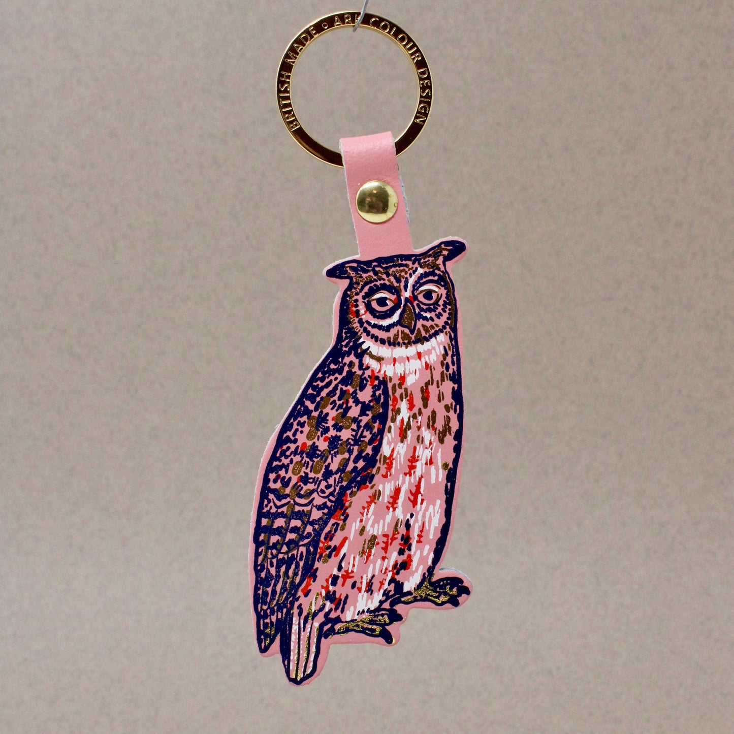 Nocturnal owl leather key fob handmade in Scotland, with gold-plated ring and hot foil embossed design by Ark Colour Design
