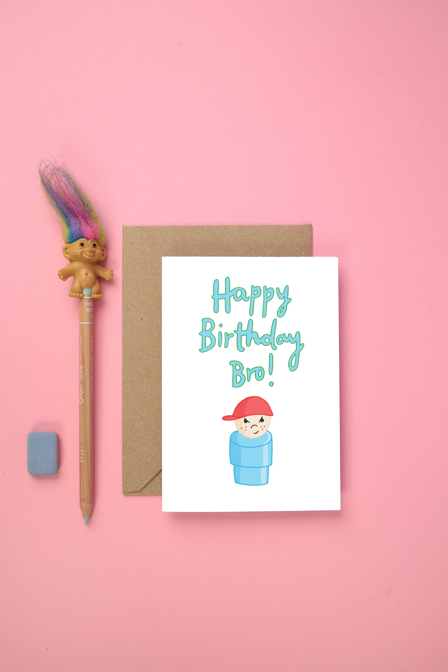 Celebrate your brother’s special day with this nostalgic and playful birthday card. Featuring a whimsical hand-drawn illustration of a beloved childhood toy, this card combines retro charm with heartfelt sentiment. The front reads "Happy Birthday Bro," making it the perfect way to let your brother know just how special he is.