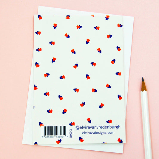Eco-friendly Best Sister Ditsy Heart card with deep blue and tangerine hearts, sustainably sourced 350gsm matt card, cream envelope, blank inside.
