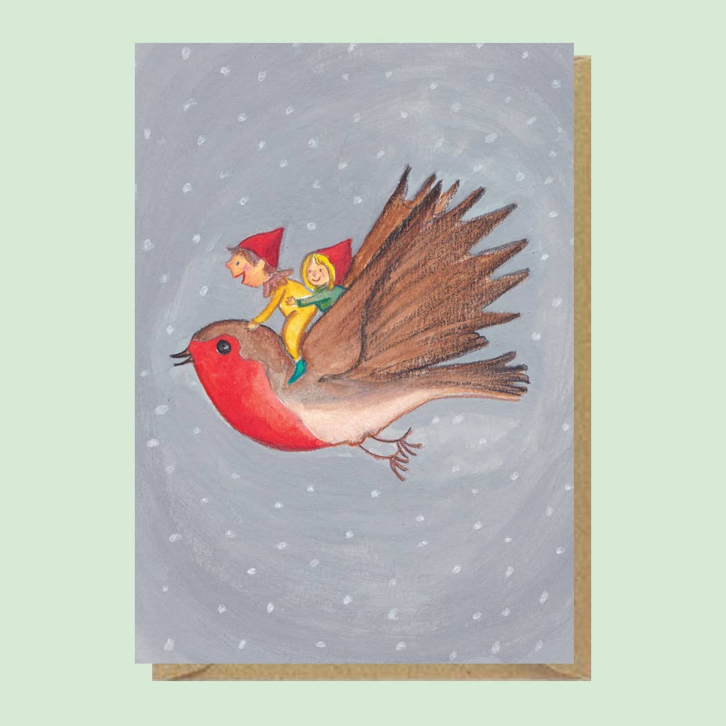 Illustrated card of Elves riding a Robin Yo ho ho. These elves are all dressed up for winter having the time of their life riding a robin across the snowy sky.