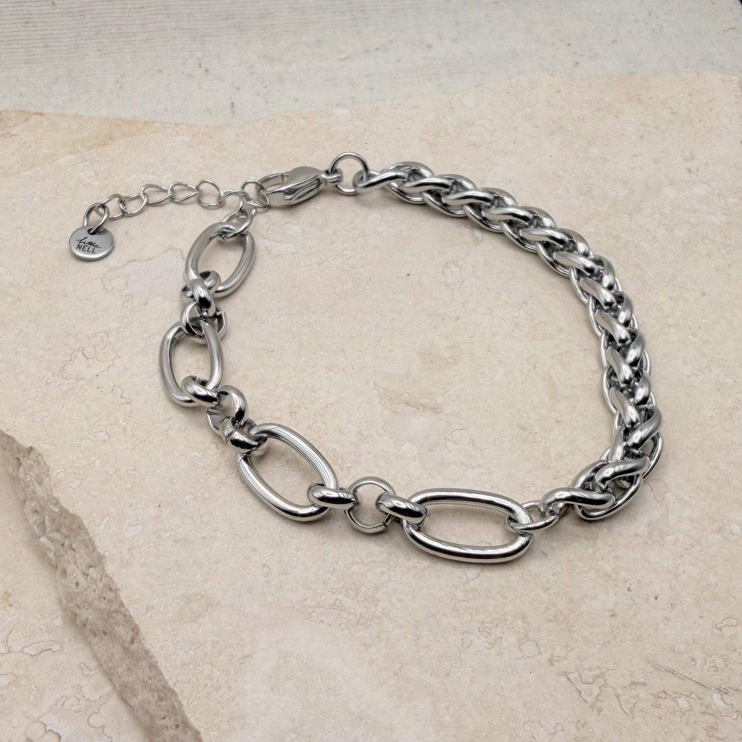 Silver bracelet showing crab claw clasp and extender chain