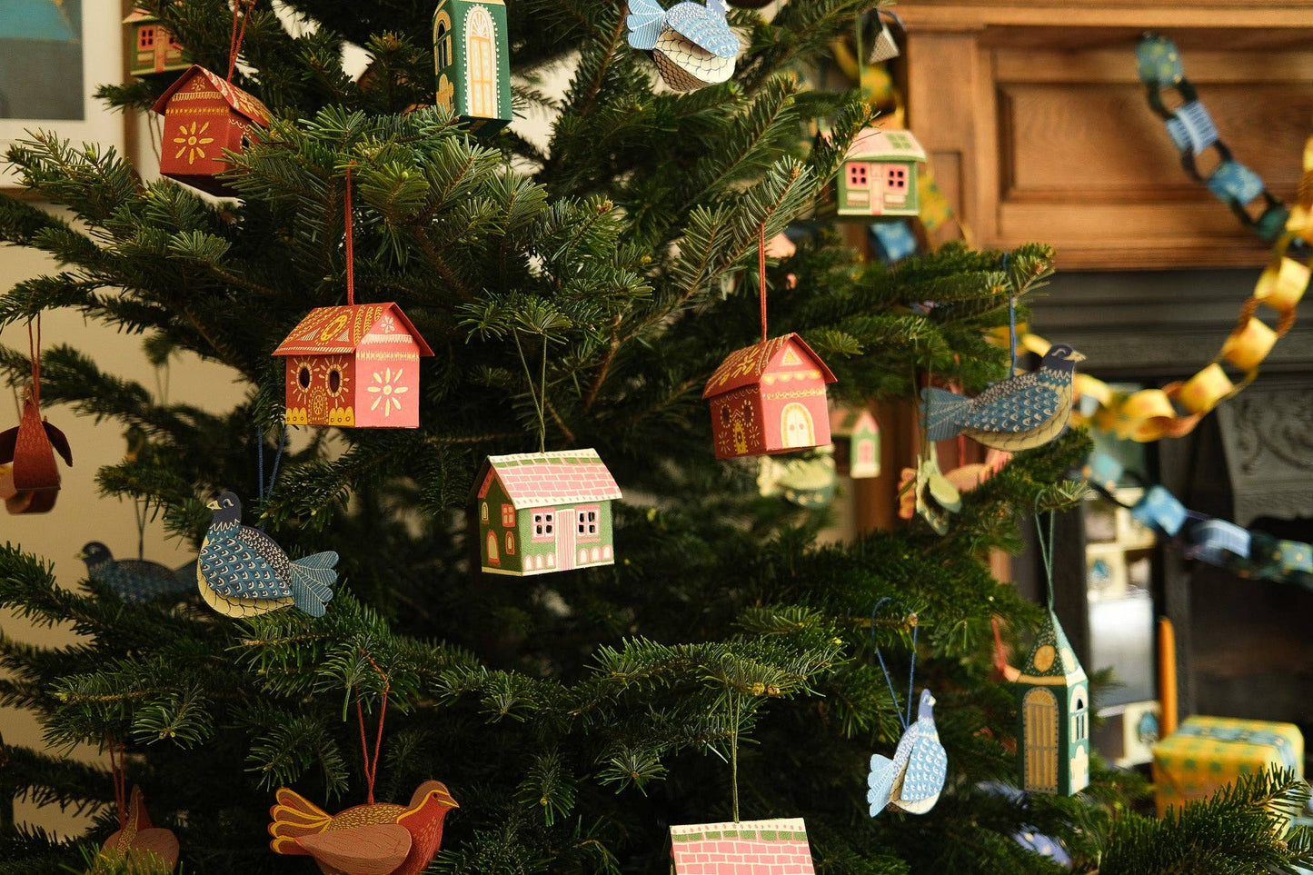 Gingerbread House Screen printed board hanging ornament, sustainably made from 100% recycled paper. 