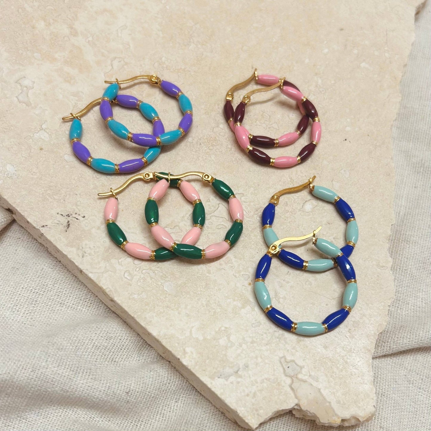Gold plated Hoop with candy stripes enamel plating. 4 colours, Lilac + Turquoise, Pink + Maroon, Green + Pink, Light Blue + Dark Blue. 31 mm wide.