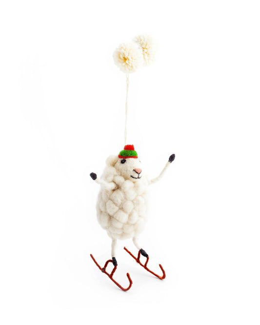 Handmade Skater Sheep Christmas decoration with detailed embroidery, fine needle felting, wooly hat, and pom pom hanger for hanging on Christmas tree.
