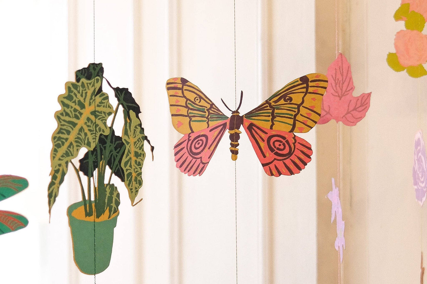 Vibrant butterfly wall hanging garland, 2 metres long, made from recycled paper and hand screen printed