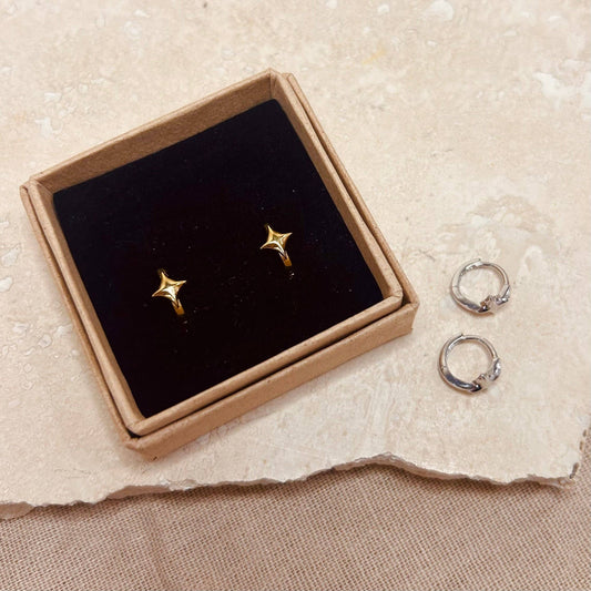 Model wearing Little Nell Gold Vermeil Starlight Huggie Hoops, highlighting 10mm size and everyday elegance.