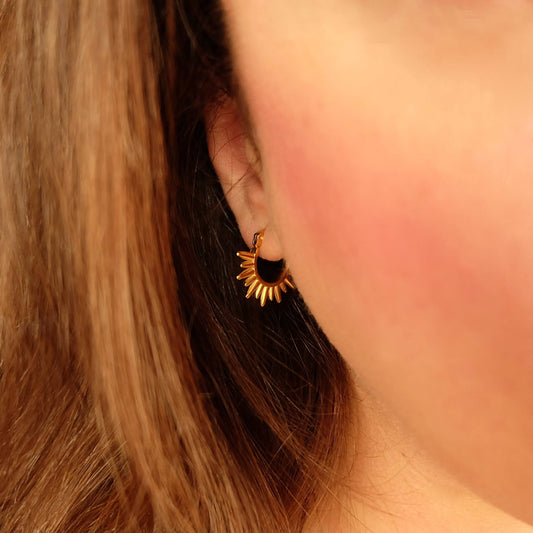 Close up of Gold Spike Sunrise Hoop Earrings