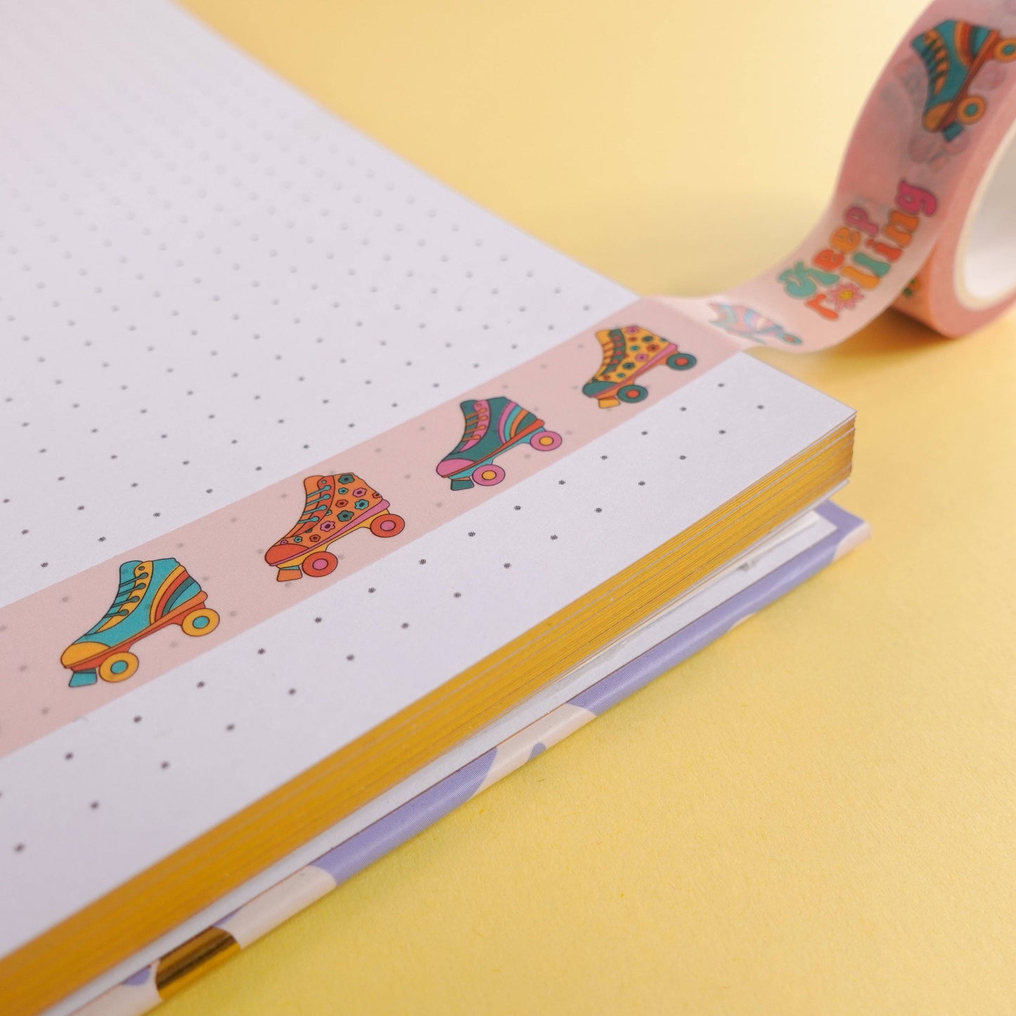 Funky washi tape with roller skate design and “Keep Rolling” message, 15mm x 10m roll, wrapped in eco-friendly paper—perfect for creative stationery and craft projects.