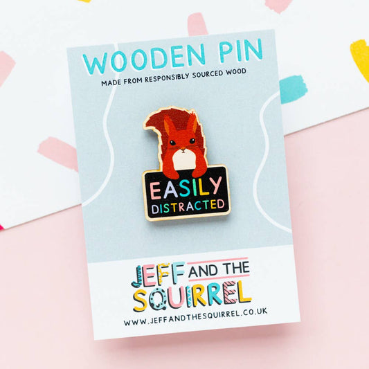 Eco-friendly ADHD squirrel wooden badge on recycled backing card