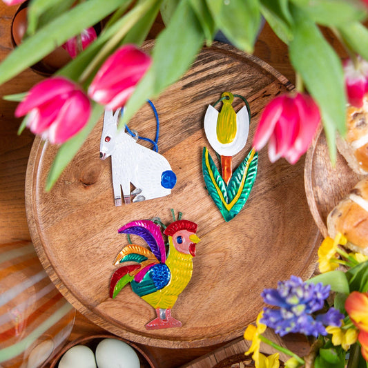 Vibrant hand-painted tin rabbit ornament, front view