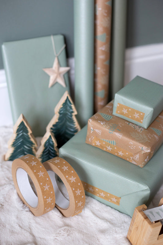 Star Paper Tape, 24mm wide 50m roll, brown kraft with star design, plastic-free, recyclable, plant-based adhesive, vegan ink, UK made.