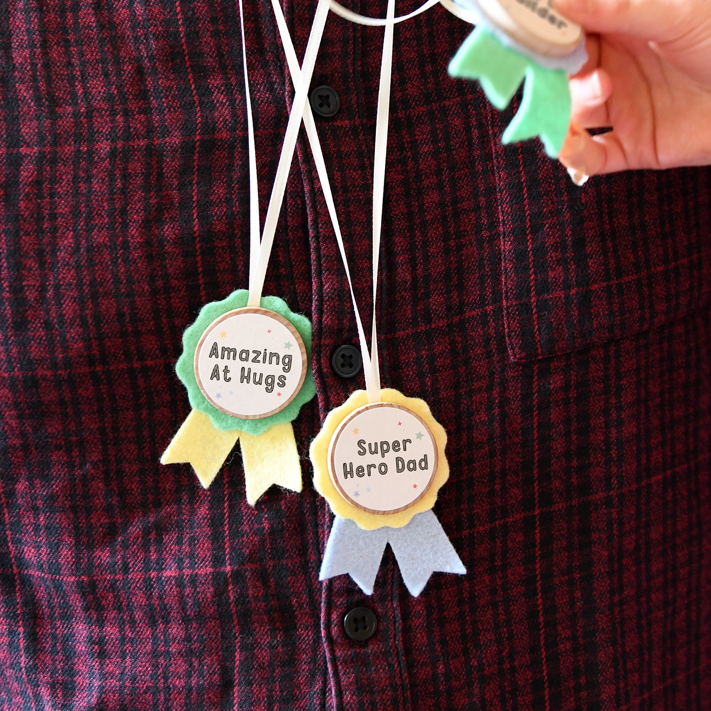 Amazing at Hugs, Super Hero Dad medals.
Craft Kit Make Your Own Medals for Dad. Make Dad three 'Best Dad' award medals for Father's Day. They're easy to make, and they're the perfect gift for your super Daddy.
The kids can make Dad a unique and personal Father's Day keepsake gift with this mini medals craft kit. It's completely plastic free and contains everything you need to make three medals, using wool felt and beech wood.