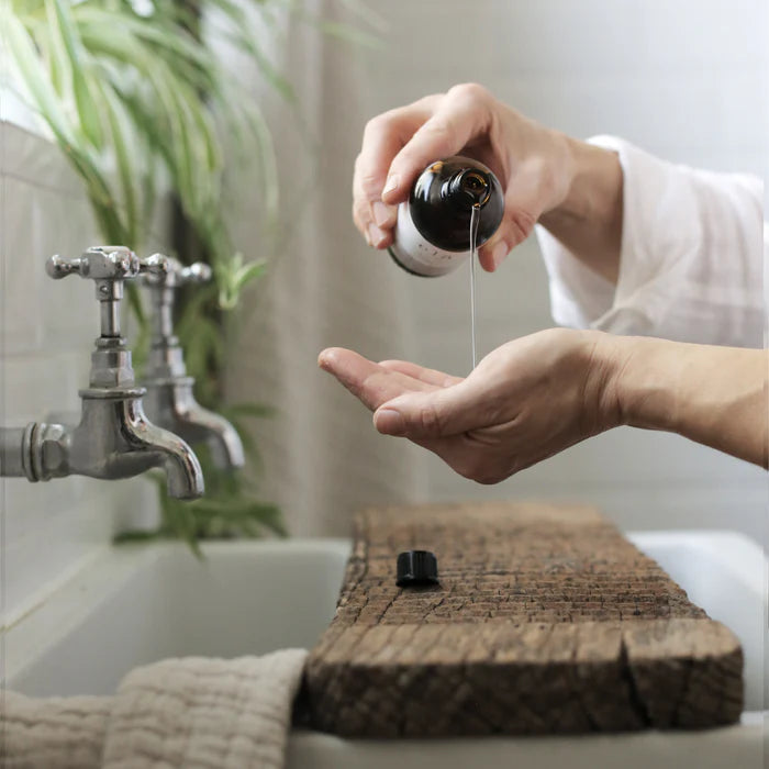 Nurture No 2 Body & Bath Oil in a serene, mindful self-care setting