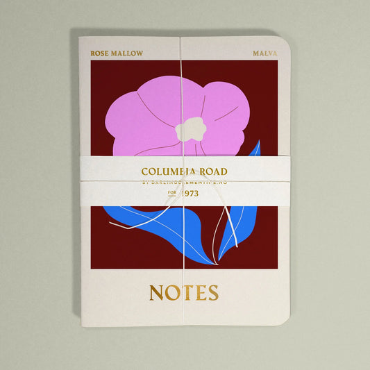 Close-up of Darling Clementine Columbia Road stitched notebooks, highlighting the gold foil details and sustainably sourced paper textures. Set of 3, handmade in Brighton.