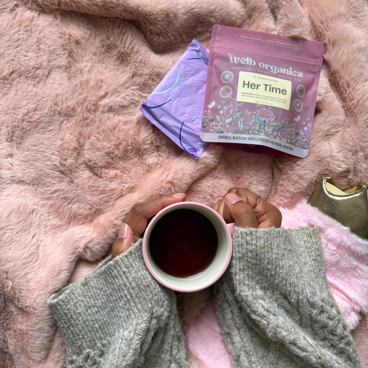 Organic loose leaf herbal tea blend with raspberry leaf, yarrow, and hibiscus