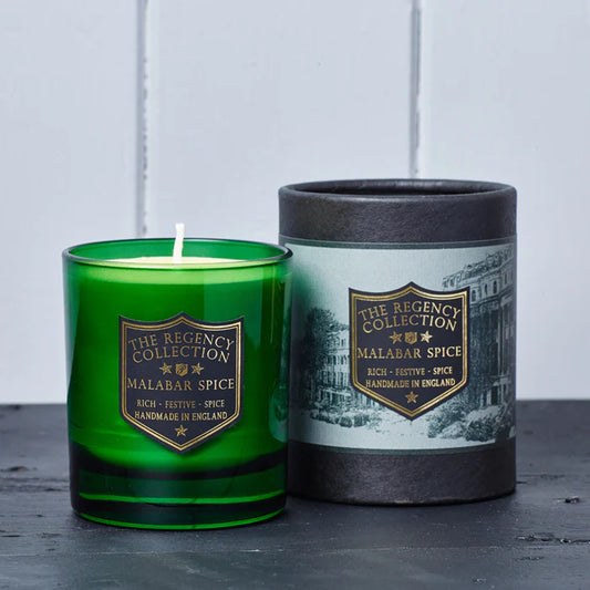 Parkminster's Regency Collection scented candles are hand blended and poured using the most exquisite combinations of premium scented oils and natural soy wax. Transform the atmosphere of your home with the luxury and opulence of scents from all around the world. Bespoke and quintessentially British, the carefully curated fragrances of the Regency Collection are natural yet robust.
With exquisite fragrance of Malabar Spice, Rich Scent, Festive Spice.
The beautiful green glass vessel is recyclable.