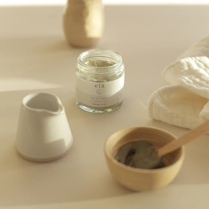 Elä Life's fragrance free natural French Green Clay is rich in minerals, elements and naturally rejuvenating oxides. Our Green Clay is one of the most majestic and effective mineral skin clays for your skin. Comes in a clear glass jar with a black lid.
The fine clay is silky soft and readily absorbs water to create a paste. This is a drying mask to nourish and cleans your skin while drawing out any impurities. Comes with a small bamboo bowl and spatula for mixing h=the clay powder with water.