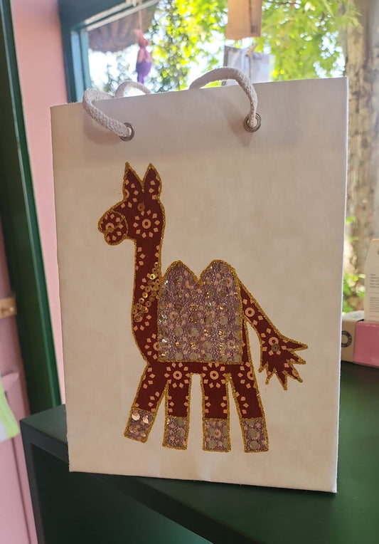 Handcrafted Medium Camel Gift Bag. Made from sari material, by a charity in India.