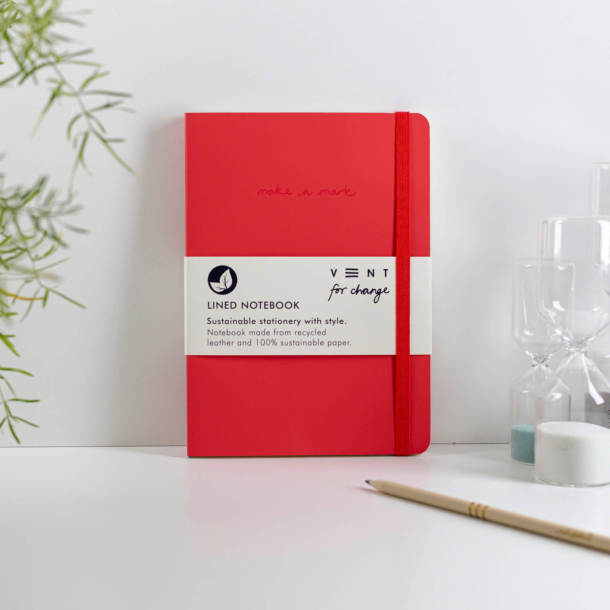 Festive red A5 notebook and green robin marker gift set flat lay