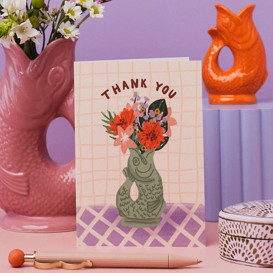 Close-up of Gluggle Jug Sage Thank You Card with kraft envelope, showcasing UK-made quality