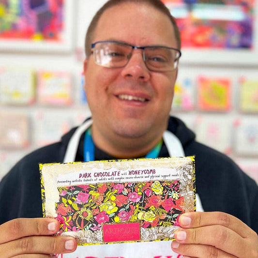 Close up of Bee Free Dark Chocolate Bar artwork