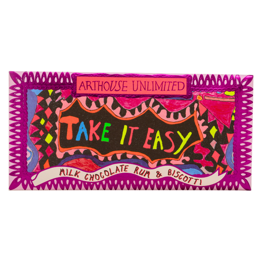 Joy Sized: Take It Easy milk chocolate bar with rum and biscotti flavour, wrapped in recyclable paper with bright artwork by Laura Tregellas.